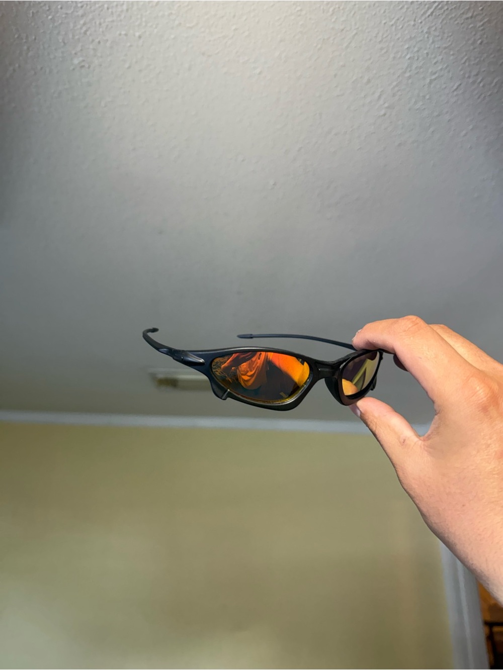 Black Sunglasses with Orange Mirrored Lenses - Oakley